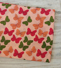 Butterfly Cotton Fabric by the Yard, Peach Background with Red Orange & Green Butterflies, Quilting Sewing Craft Dressmaking Loose Fabric